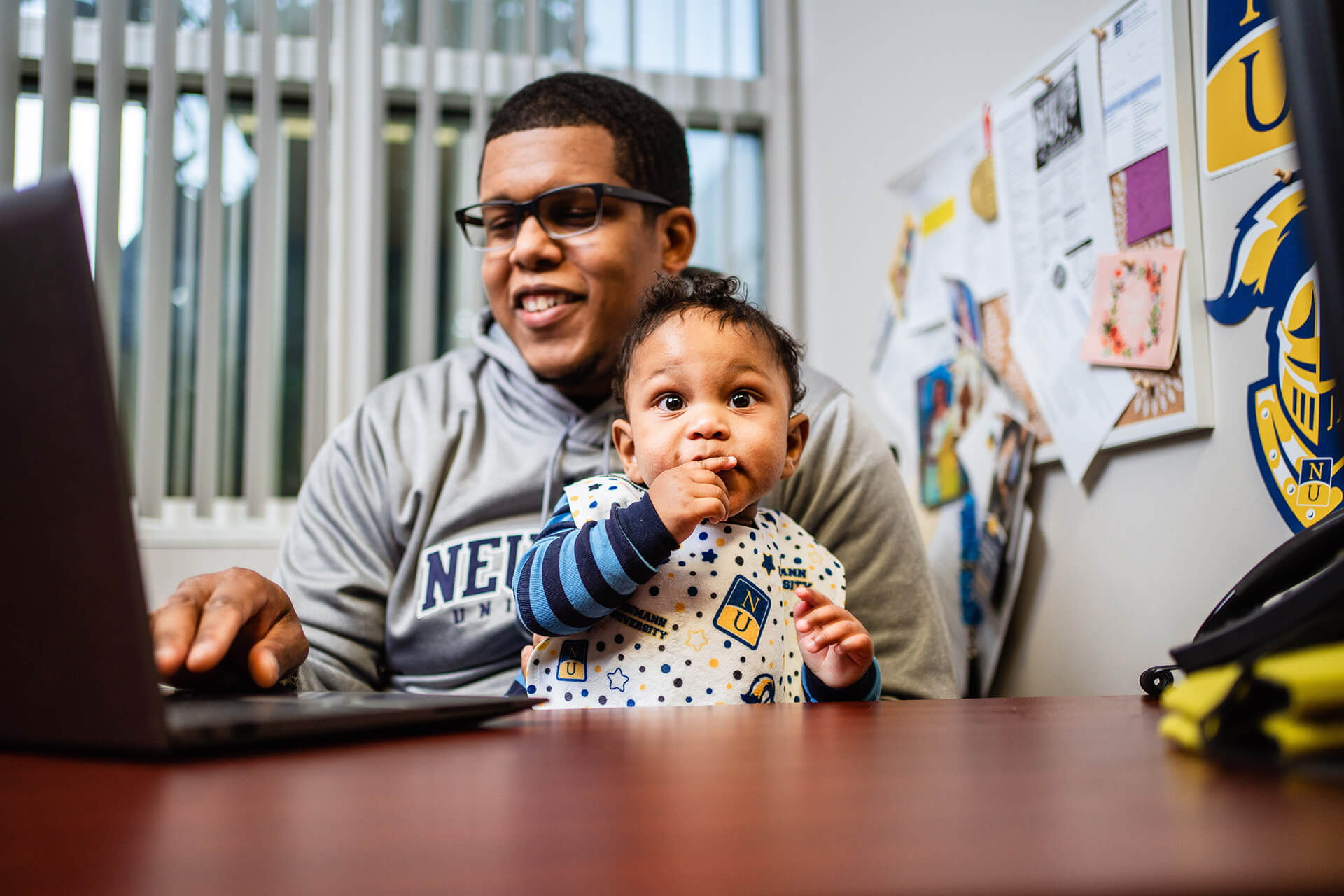 degree-completion-student-man-with-baby